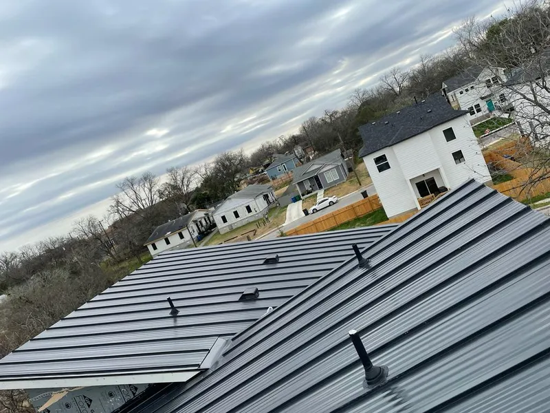 Standing seam metal roof panels with vents for Skylight Repair in Kenton